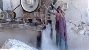Courtesy Toxics Link. 
A women worker in an Asbestos mill. Workers are directly exposed to all the asbestos dust in milling units.